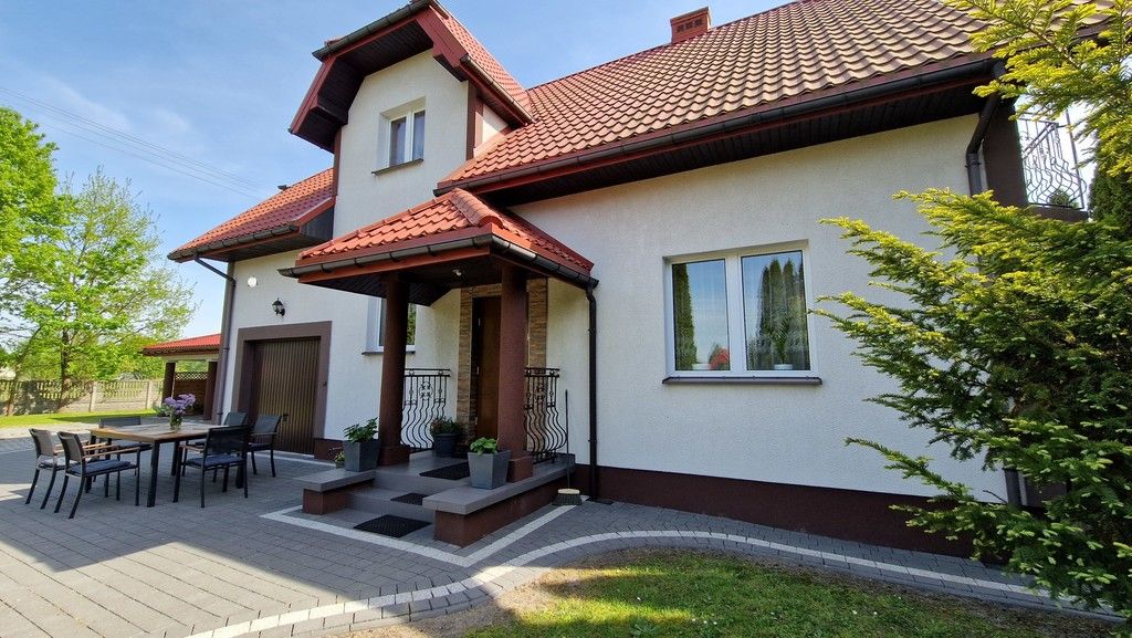 Dom z osobnym garażem na 2 auta na pięknej działce