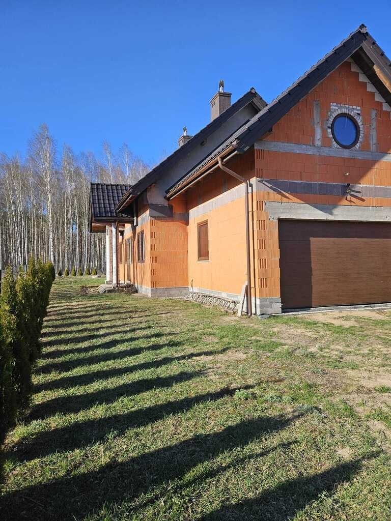 Dom piętrowy w stanie surowym zamkniętym – 260 m²